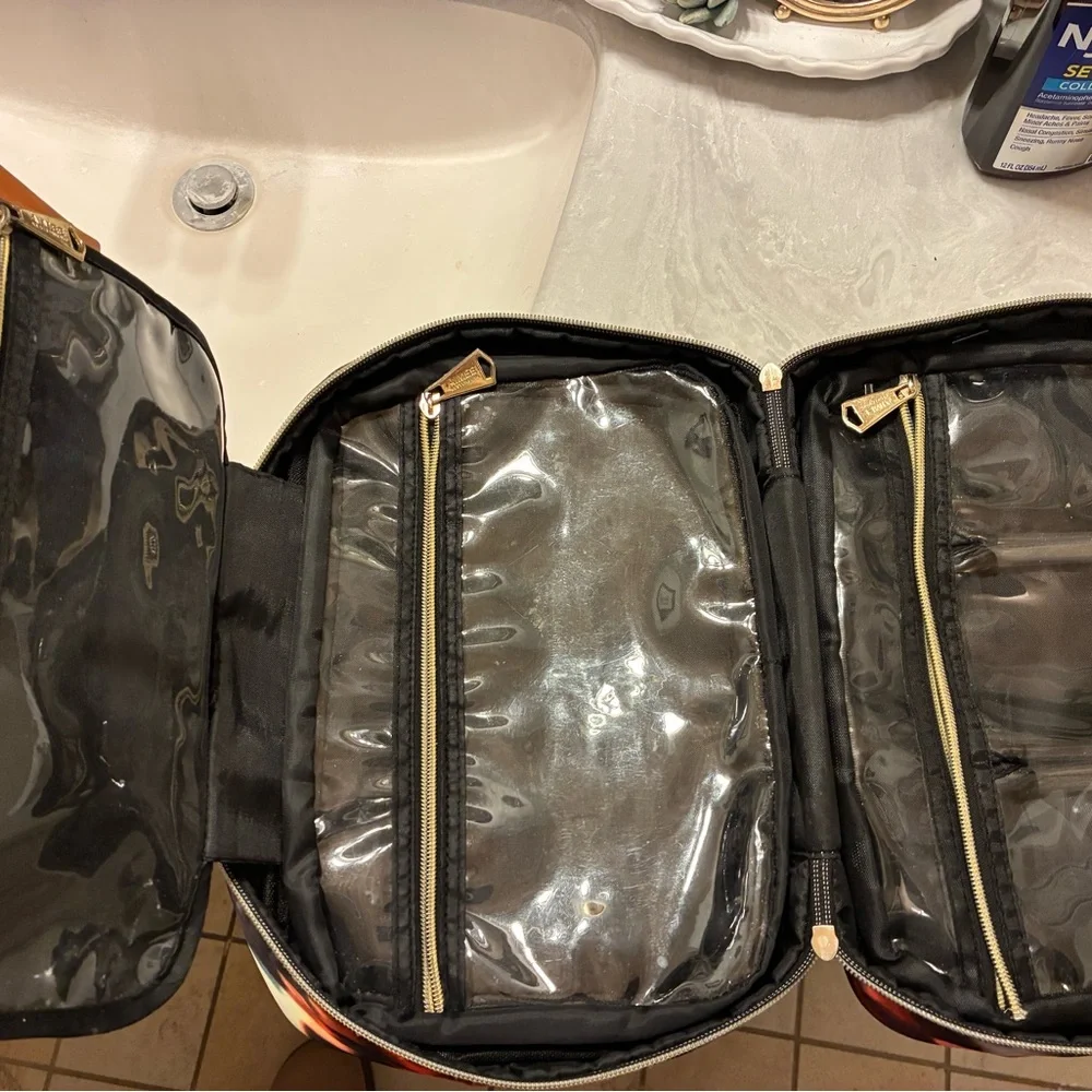 Aimee Kestenberg Black and Gold make up‎ bag